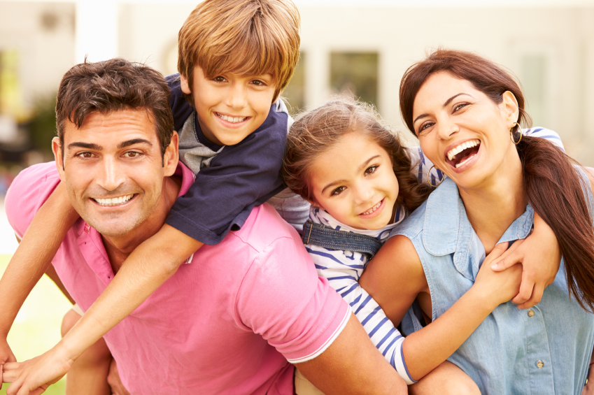 Smiling family of four